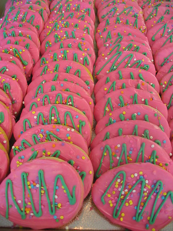 A bunch of decorated cookies.